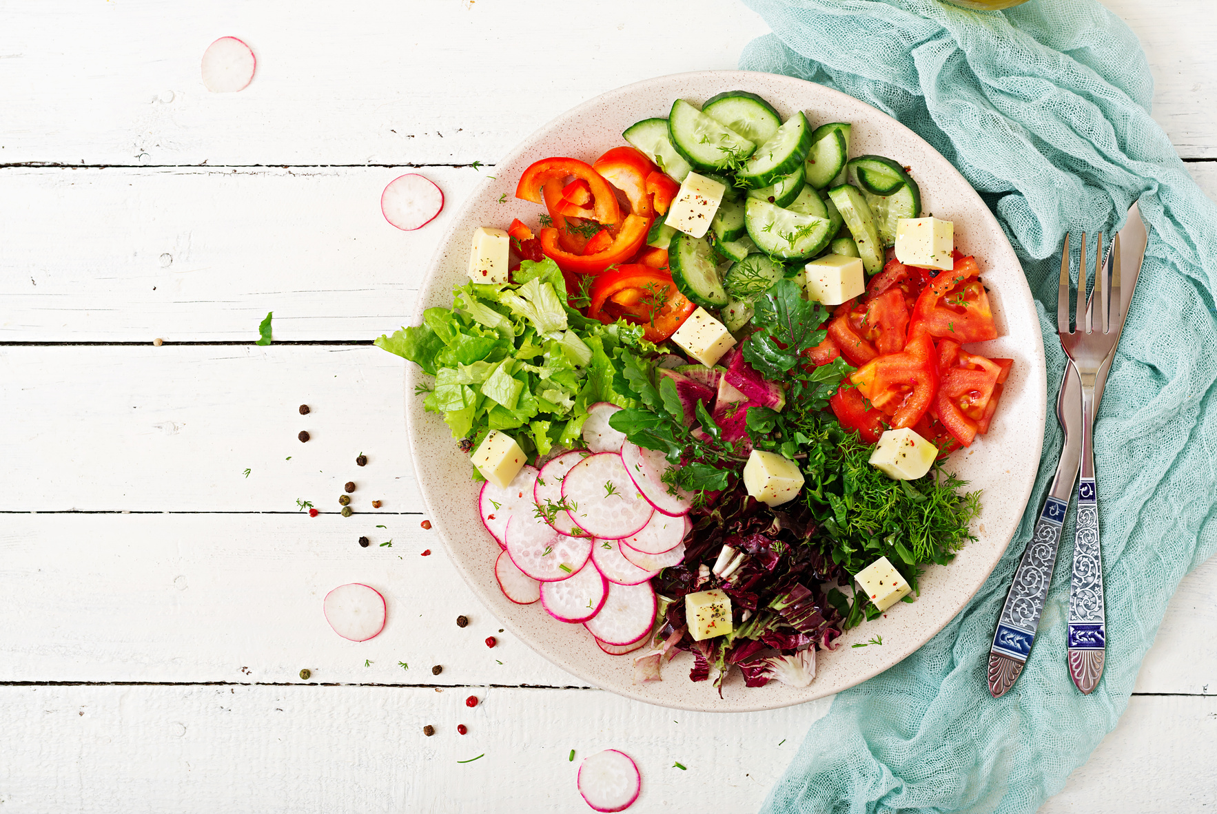 Mix salad from fresh vegetables and greens herbs. Dietary menu. Proper nutrition. Healthy lifestyle. Flat lay. Top view